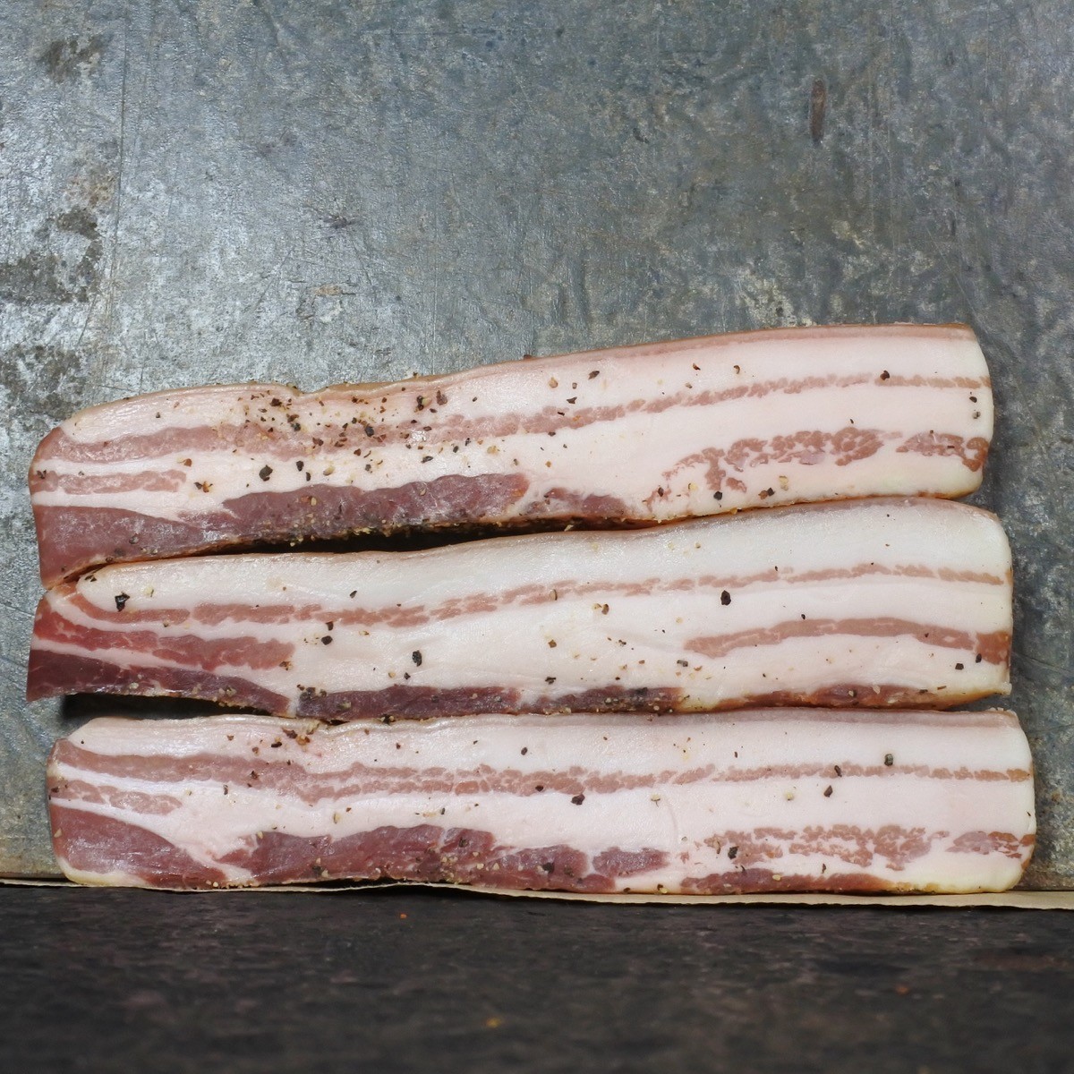Pancetta met zwarte pepers