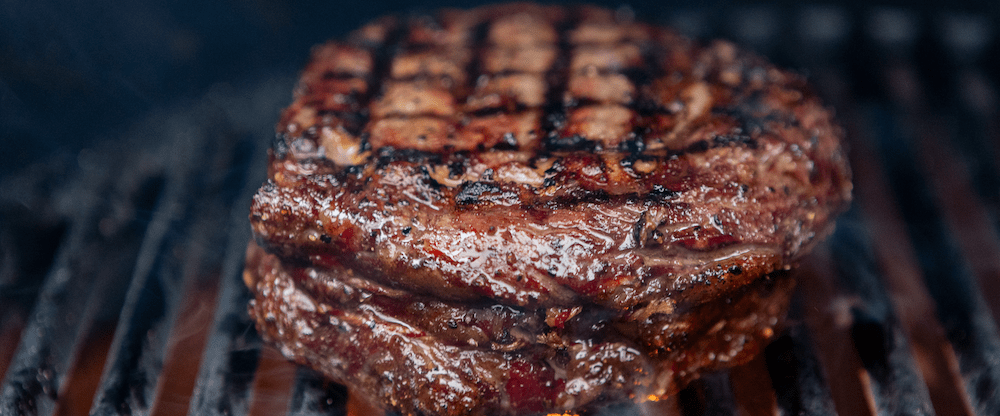 Ribeye met kruidenboter van gepofte knoflook